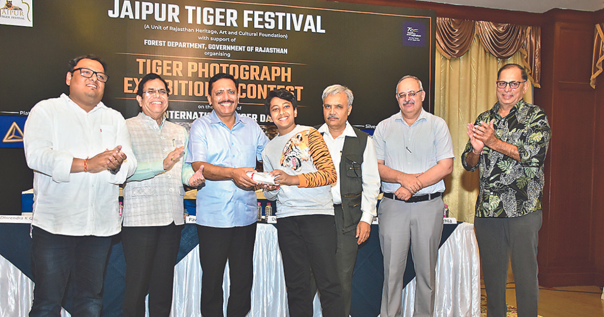 Lensmen felicitated at Tiger Festival